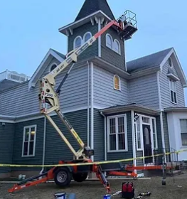 men working on a roof